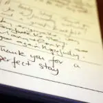 Close up of Ogilvy House Guest Book.