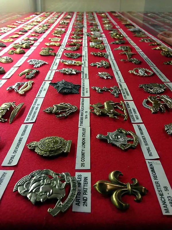 Military badges on display at The Muckleburgh Collection.