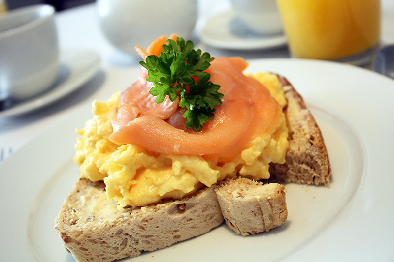 Smoked salmon and scrambled egg on toast.